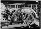 A CORLISS STEAM ENGINE AND MILL DRIVE GEARS.